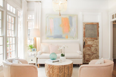 Mid-sized transitional open concept medium tone wood floor and brown floor living room photo with white walls, no fireplace and no tv