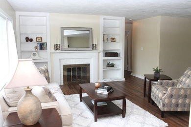 Living room - mid-sized modern dark wood floor living room idea in New York with beige walls