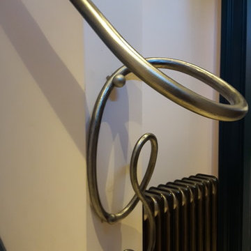 Hot forged interior handrail