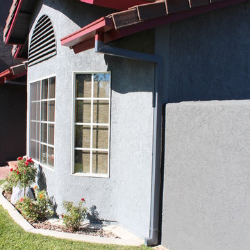 Seamless Box Style Gutters, Colonial Red, Storm Gray Downspouts