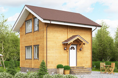Ejemplo de fachada clásica pequeña de dos plantas con revestimiento de madera y tejado a dos aguas