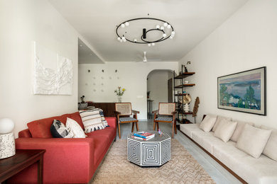 Living room - tropical living room idea in Other