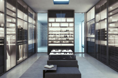 Walk-in closet - huge modern gender-neutral marble floor and gray floor walk-in closet idea in Los Angeles with glass-front cabinets and dark wood cabinets