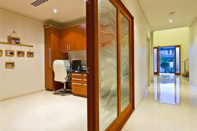 This is an example of a contemporary home office in Gold Coast - Tweed.