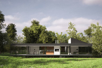 Идея дизайна: двухэтажный, серый дом в современном стиле с облицовкой из бетона и плоской крышей