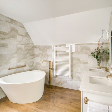 Bath Suites – A Study in Light, Material, and Proportion