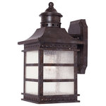 Savoy House - Savoy 5-440-72, Seafarer Wall Mount Lantern - Traditional and attractive, this Seafarer lantern brings timeless style to the exterior of your home. The classic box lantern shape, curved mansard roof, and delightful top finial, evoke the charm of vintage lighthouses. The rectangular box frame has wonderful detailing: horizontal bars across the sides, shaped corners on the wall plate, and rows of petite diamond-shape cut-outs along the top, bottom, and around the top finial. Panes of textured, pale cream-colored glass add to the vintage appeal. And one 60W, E-style bulb illuminates the area. 6.5`` wide and 12.5`` high a perfect size for classic lighting on your porch, patio, sunroom, pergola, or other covered walls of your outdoor living areas.