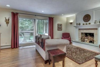 Example of a classic family room design in Boston