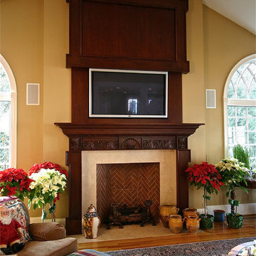 Mahogany Mantle and Overmantle with hidden TV. Design by Skip Sroka