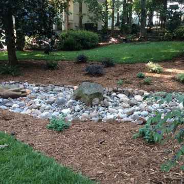 Holly Springs River Rock Creekbed - Drainage Mitigation