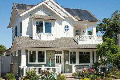 Inspiration for a coastal white three-story exterior home remodel in San Diego