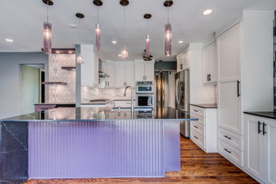This is an example of a transitional kitchen in Dallas.