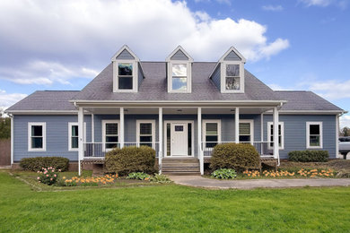 Craftsman blue two-story concrete fiberboard house exterior idea in Raleigh