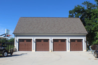 Garage workshop - huge craftsman detached four-car garage workshop idea in Atlanta