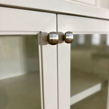 Custom Built-In Media Wall with Glass Display Cabinets