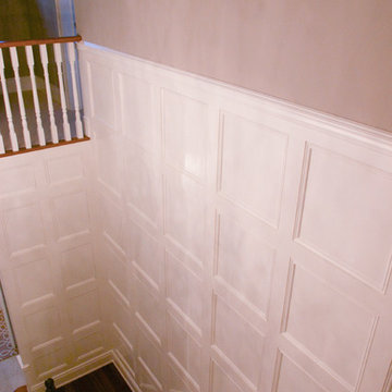 Sophisticated wainscoted stairway