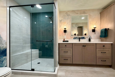 Inspiration for a mid-sized master single-sink corner shower remodel in Milwaukee with shaker cabinets, beige cabinets, quartz countertops, white countertops and a freestanding vanity