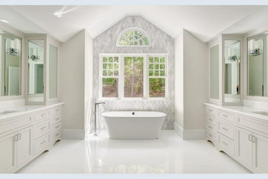 Bathroom - transitional gray tile and mosaic tile porcelain tile and white floor bathroom idea in Boston with recessed-panel cabinets, white cabinets, quartzite countertops, white countertops, white walls and a drop-in sink