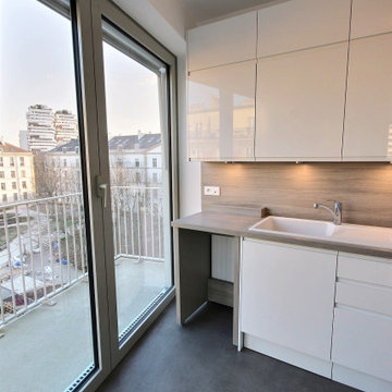 Aménagement d'une cuisine et d'une entrée dans un logement neuf à Paris