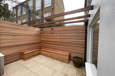 Inspiration for a traditional patio in London.