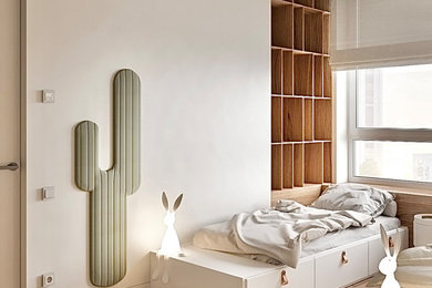 Réalisation d'une petite chambre d'enfant de 4 à 10 ans design avec un mur blanc et parquet clair.