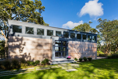 Small trendy brown one-story wood exterior home photo in Boston