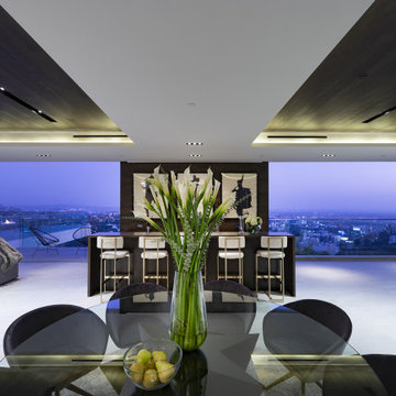 Los Tilos Hollywood Hills luxury home modern open plan dining room with glass wa