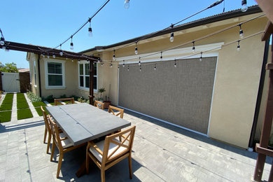 Example of an arts and crafts patio design in Orange County