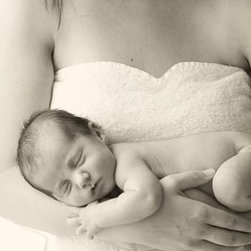Baby in mother's arms - Products