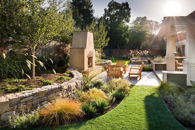 Patio - contemporary patio idea in San Francisco with a fireplace