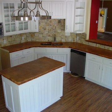 Kitchen with Concrete Countertops with Rock Edge