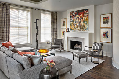 Large trendy formal and open concept dark wood floor, brown floor and tray ceiling living room photo in Chicago with gray walls, a ribbon fireplace, no tv and a stone fireplace