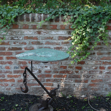 Bird baths made from recycled auto glass