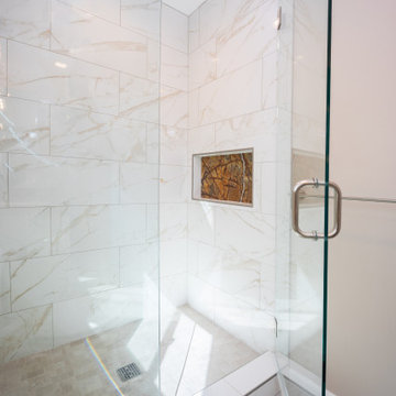 Decorative niche is Rain Forest Marble to match the countertop