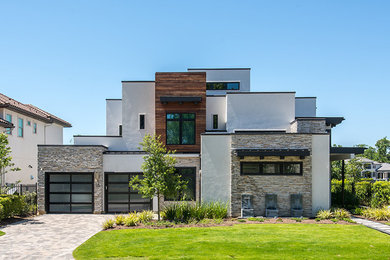 Inspiration for a contemporary flat roof remodel in Houston