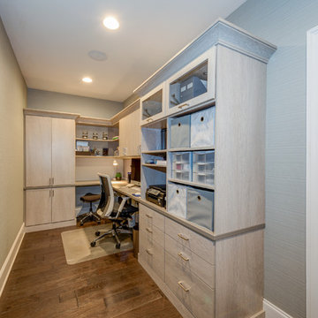 Her Home Office utilizes a narrow alcove. Custom closet system. Textured