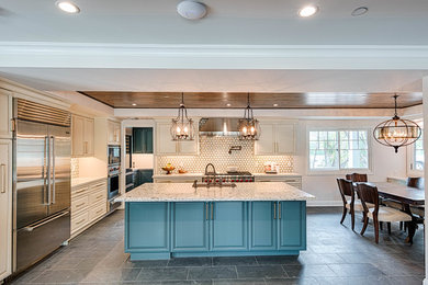 Eat-in kitchen - country u-shaped ceramic tile, gray floor and wood ceiling eat-in kitchen idea in Los Angeles with an undermount sink, recessed-panel cabinets, turquoise cabinets, white backsplash, porcelain backsplash, stainless steel appliances, an island and white countertops