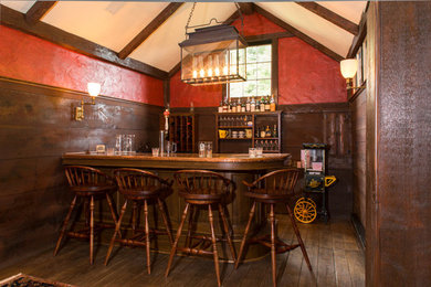 Inspiration for a rustic home bar remodel in Columbus