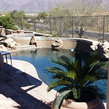 This is the finished Renovation with Travertine Coping, new tile, and the walls