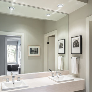 Transitional kids' white tile and porcelain tile porcelain floor bathroom photo in Austin with flat-panel cabinets, white cabinets, gray walls, a drop-in sink and tile countertops