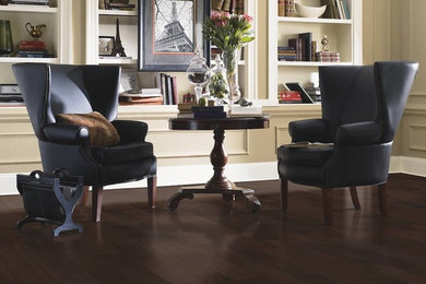 Mid-sized transitional enclosed dark wood floor living room library photo in St Louis with beige walls, no fireplace and no tv