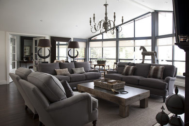 Living room - huge contemporary open concept dark wood floor and brown floor living room idea in Montreal with white walls and a wall-mounted tv