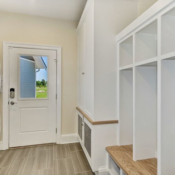 Laundry room with built in storage space