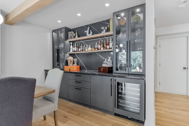 Inspiration for a cottage home bar remodel in Toronto