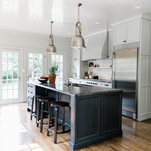 black countertops light gray cabinets white appliances