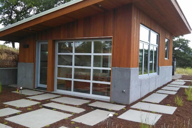 Inspiration for a mid-sized modern detached one-car garage remodel in Other
