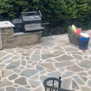 Outdoor Kitchen with Fire Feature & Beer Tap and Flagstone Patio