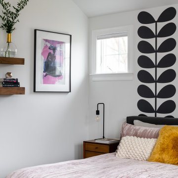 Modern Bedroom With Graphic Wall Mural and Blush Textures