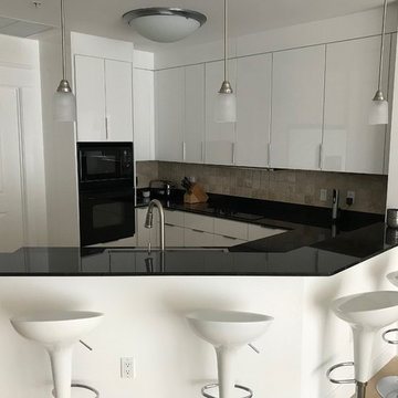 Modern Kitchen Remodel Done With High Gloss Acrylic Doors