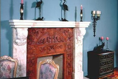 Living room - living room idea in Portland Maine with a standard fireplace and a tile fireplace